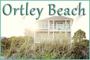 Ortley Beach real estate is booming because of beautiful homes like the one pictured. Ortley Beach is written in teal in a script-font